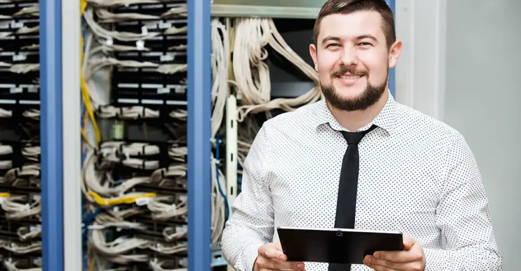 IT Admin holding Tablet