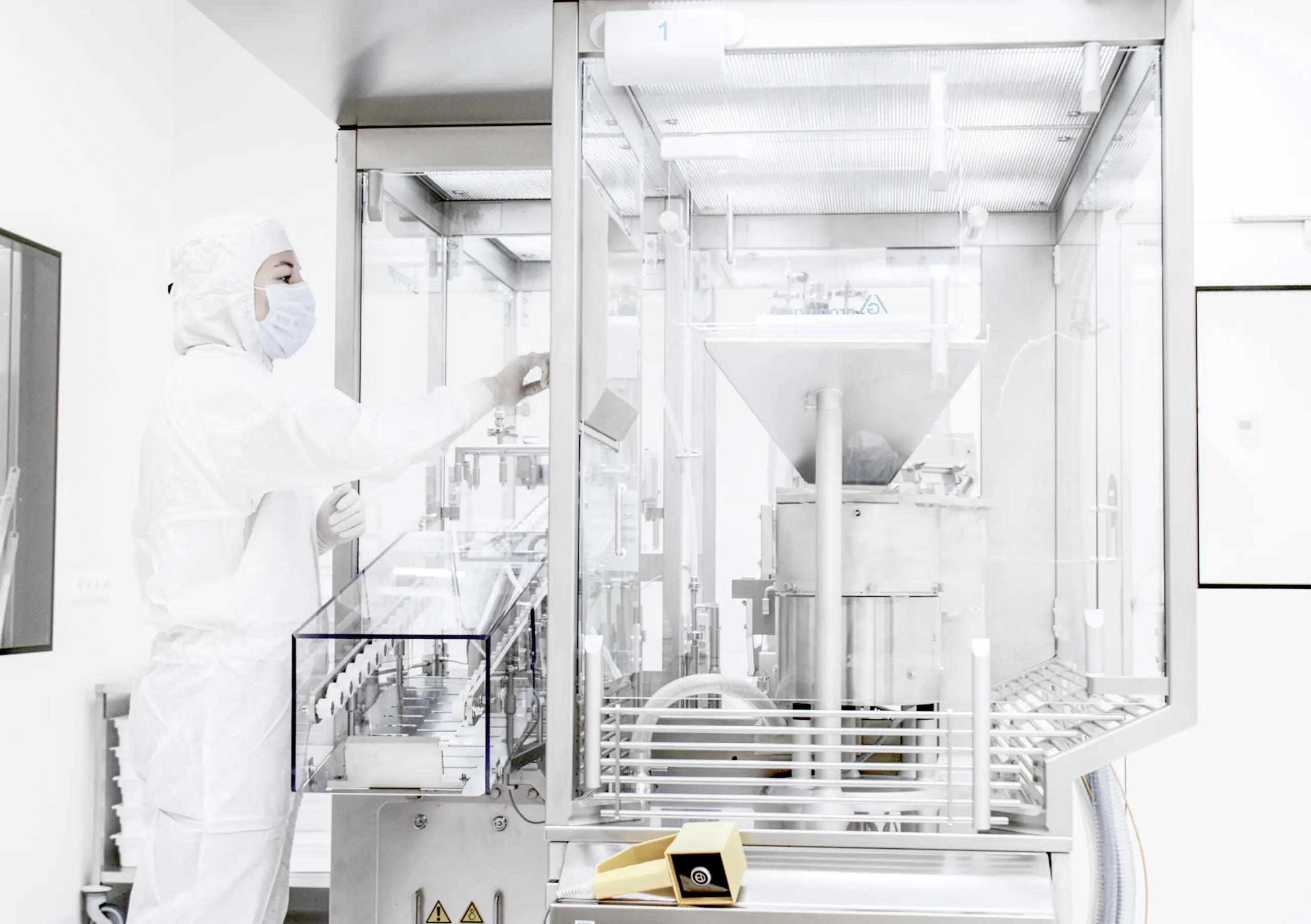 ALBOMED employee working with medical technology